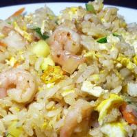 Shrimp Fried Rice / 새우볶음밥 · Stir-fried white rice, eggs,  vegetables and shrimps.
served with Kim Chee.