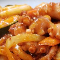 Stir-Fried Octopus / 낙지볶음 · Nahkji Bohk Eum / stir-fried octopus and vegetables with spicy sauce.
served with Kim chee, ...