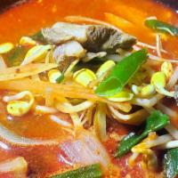 Tender Beef & Vegetable Soup / 국밥 · Guk bap / tender beef and assorted vegetables in spicy egg drop soup.
served with Kim chee, ...