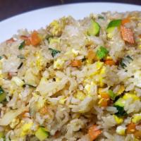 Vegetable Fried Rice / 야채볶음밥 · Stir-fried white rice with eggs and vegetables.
served with Kim Chee.