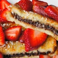 Ou La La Strawberry Nutella · Classic French toast topped with fresh strawberry, Nutella, garnished with mint leaves and w...