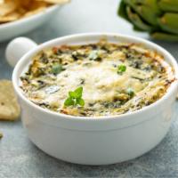 Spinach Artichoke Dip · Delicious dip made from a mix of cream cheese, sour cream, cooked spinach, marinated articho...