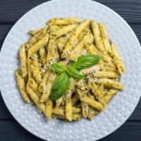 Pesto Penne · An aromatic pasta dish consisting of penne with delicious pesto sauce and seasonings.