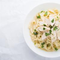 Chicken Fettuccine Alfredo · An aromatic pasta dish consisting of fettuccine with butter, Parmesan cheese, cream, chicken...