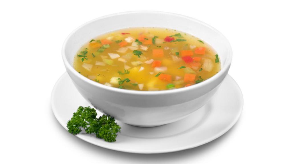 Veggie Lemon Soup · Traditionally prepared soup made of a garden medley blend of carrots, onions, tomatoes, celery root, leeks, potatoes, cabbage, peas, broccoli and garlic, topped off with fresh lemon juice.