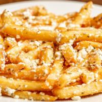 Greek Fries · With feta cheese, fresh lemon, extra virgin Greek olive oil and Greek spices.