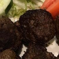 Keftedes · Greek seasoned ground beef meatballs.