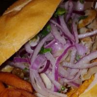 Pan Con Chicharron
 · Crunchy fried pork over sweet potato slices and topped with sarza on a roll served with Fren...
