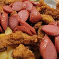 Salchi-Pollo · Sliced hot dog over French fries topped with Chicken Fingers with assortment of dipping sauce.