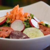 Ensalada Mixta · Mixed Garden Salad-Chopped Romaine lettuce w/ Tomato, Cucumber, Beets, Radishes, Shredded Ca...