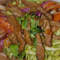 Tallarines Verdes C/ Lomito Al Jugo De Carne · Spaghetti in Spinach-Basil sauce topped Beef Juicy Lomito