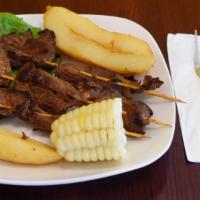 Porcion De Anticuchos
 · Peruvian style Beef Shish Kabob served with Golden Potato, Peruvian Corn on the Cob & Salad
