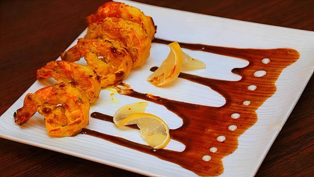 Kesari Jhinga · Jumbo shrimps marinated in saffron, yogurt, ginger and garlic.