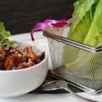 Chicken Lettuce Wraps · Diced chicken, onion, jicama, French beans, red pepper flakes, tempura crunch, served with l...
