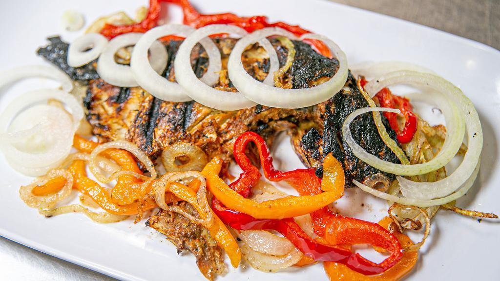 Jerk Fish · Your choice of Croaker or Snapper soaked and seasoned with our signature jerk fish seasoning.