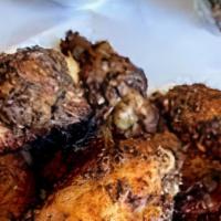 Jerk Wings · Our wings are jerked to Jamaican perfection seasoned with our signature dry rub. Be sure to ...