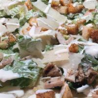 Chicken Caesar Salad Pizza · Romaine lettuce, grilled chicken, croutons, Caesar dressing
