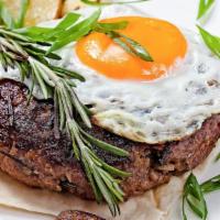 Hanger Steak With Two Eggs · Juicy hanger steak and fresh eggs prepared any style and served with a side of potatoes and ...