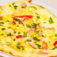 Western Omelette · Juicy diced ham with fresh and locally grown peppers and onions sauteed then folded into an ...