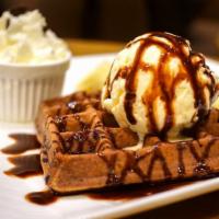 Waffle Sundae · Fresh made golden waffle topped with two scoops of Haagen-Dazs ice cream, chocolate syrup, w...