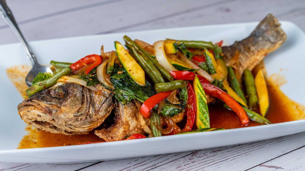Striped Bass Crispy Basil · Spicy. Fried whole striped bass topped with sautéed string bean, onion, red bell peppers and zucchini in basil sauce.