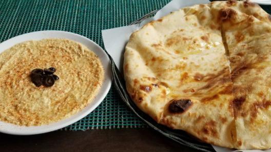 Hummus With Garlic Naan · Homemade. Chickpeas and tahini paste.
