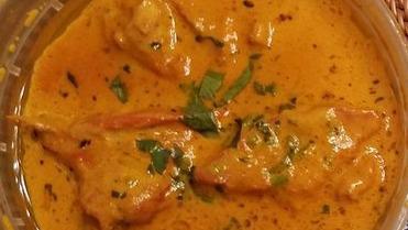 Traditional Butter Chicken · Gluten-free. Rich creamy tomato sauce and mawa cheese.
