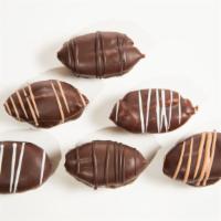 Mini Eclairs (36) · Round chocolate truffle dough dipped in chocolate.