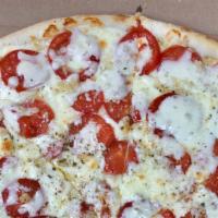 Tomato & Garlic Pizza · Fresh sliced tomatoes, mozzarella, touch of garlic and oregano, Romano cheese, no sauce.
