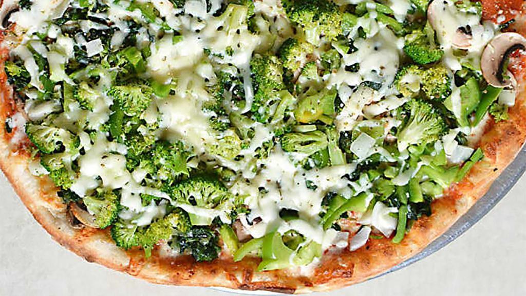 Vegetable Pizza · Mushrooms, peppers, onions, broccoli, spinach and mozzarella.
