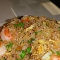 Young Chow Fried Rice · Mixed protein of chicken, shrimp, and pork.