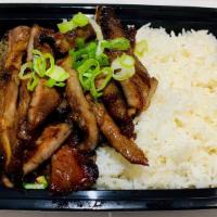 Grilled Pork Over Rice · It comes with cucumber, tomato, and vietnamese vinaigrette dressing on the side.