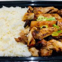 Grilled Chicken Over Rice · It comes with cucumber, tomato, and vietnamese vinaigrette dressing on the side.