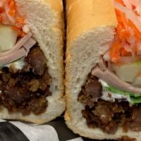 Classic Sandwich · Pate, vietnamese ham, roasted grilled pork, mayonnaise, butter, cucumber, julienne carrots, ...