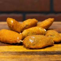 Jalapeno Poppers · Delicious fresh fried jalapeno poppers served with a chipotle ranch.