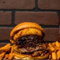 Ultimate Bbq Burger · Brisket, pulled pork, onion rings, cheddar cheese, and bacon on top of an 8oz beef patty top...