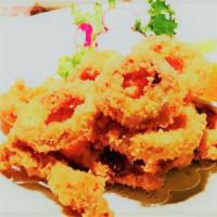 Fried Crispy Calamari · Deep fried squid served with  Thai sauce