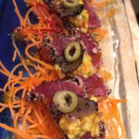 Tuna Tataki · Lightly seared tuna sashimi with  chef's special sauce