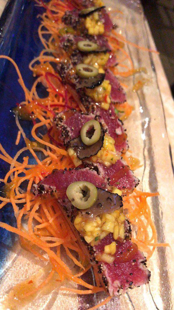Tuna Tataki · Lightly seared tuna sashimi with  chef's special sauce