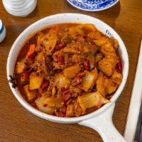 Monstrous Plate Chicken · Spicy. Chopped chicken, sautéed with fried onions, and peppers, then stewed with potatoes an...