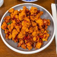 Spicy Popcorn Chicken · Spicy. Fried dark meat chicken coat in flour sautéed with dry pepper, long hot pepper, and S...