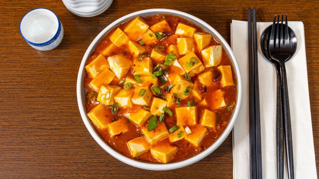 Ma Po Tofu · Spicy. Tofu set in spicy and numbing sauce mixed with Szechuan douban sauce.