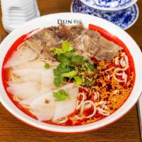 Traditional Lanzhou Beef Noodles · Spicy. Pulled noodles topped with slices of beef, radish, cilantro in prime beef broth, and ...