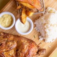 Pollo A La Brasa Entero  (Whole Chicken) · Charcoal roasted whole free range chicken served with house fries or jasmine rice, house sal...