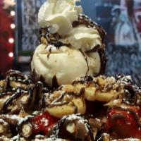 The Crunchy Crepe · REAL Strawberries, Sliced Banana's topped w/ Nutella Chocolate, crushed Chocolate Pretzels &...
