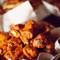 Herbed Tossed Wings · In a fresh sage, thyme and scallion mix. All wings are bone-in and served with a side of yel...