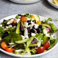 Mixed Greens Salad · Refreshing mix greens salad with selected toppings.