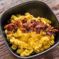 Mac 'N' Cheeze · rotini pasta and soy-based cheeze sauce topped with coconut bacon. vegan.