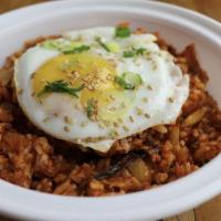 Wagyu Kimchi Fried Rice · Fried rice with kimchi and ground wagyu beef topped with sunny side up egg. Gluten-free.