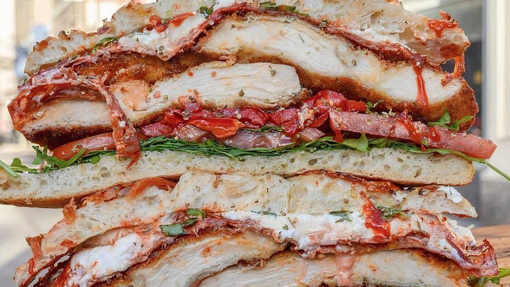 The Stallion Sandwich · Chicken cutlet, roasted red peppers, fresh mozzarella, broccoli rabe, prosciutto, balsamic drizzle on toasted focaccia.